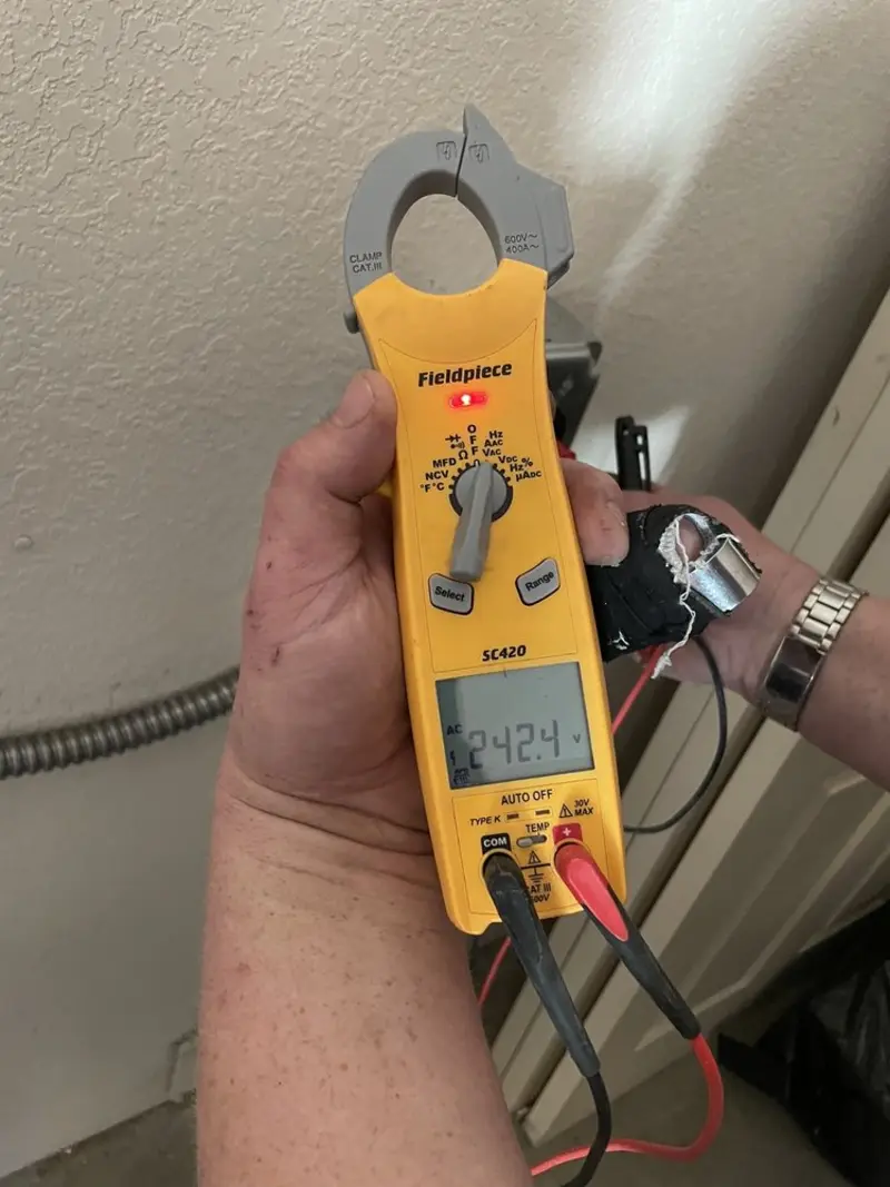 Voltage testing with clamp meter during Circuit Breaker Repair in Phoenix